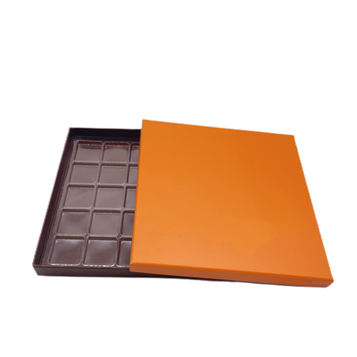 Luksusowe opakowanie czekoladowe Pomarańczowe pudełko z papieru pakowego 25 sztuk z plastikowym wnętrzem
